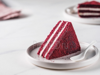Piece of red velvet cake with perfect texture